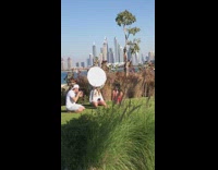 red bikini grass light reflector white hat 