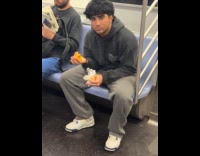 Man eats food make mess inside train