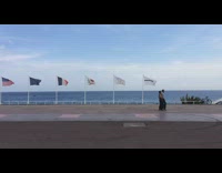 Guy on scooter use wind umbrella surfing