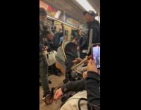 Two guys sings Spanish on train ride