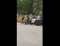 Three men surfer police photo shoot car