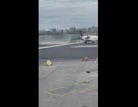 Guy does push-ups at airport