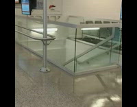 Guy white sleeves sleep floor airport lobby