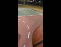 Guy shoots basketball one hand and misses