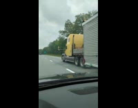 Semi truck carry and transport house on road