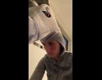 Two girls in costumes in bathroom throwing up