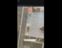 Couple poses on helipad 