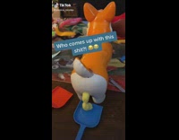 Woman reacts to dog kids toy 