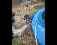 Kid stabs portable pool and floods backyard