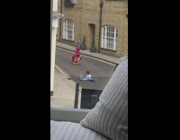 Red sports bra girl yoga pose street 