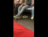 Collab WINY - Man ride subway with shoes off grey socks