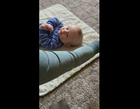 Baby blue pajama reaction to head massager whisk