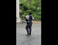 Batman dance with group singing at park