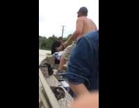 Guy jumps flips metal bridge lands back