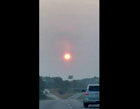Bright sun perfect circle from the highway
