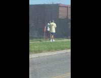 Man white shirt music video train pass by