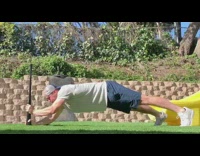 Guy does planks black baseball bat 