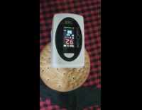 Pulse Oximeter on a biscuit shows statistics