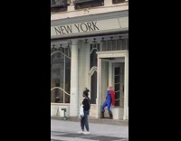 Blue spandex bodysuit bald guy red cape