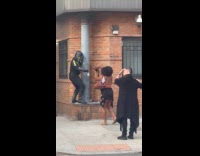 Photo shoot Mandalorian costume pose beside pillar