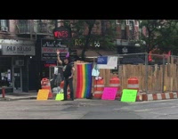 Man purple wizard hat dance pride fest