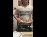 Man Lifts Shirt and Shows Body Build