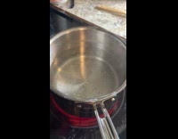 Filmer shows boiling water in pot