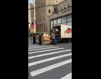 Collab winy - Truck unload boxes on street NBC building