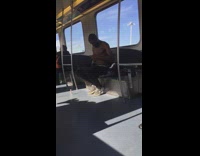 Man lathers himself in oil on train