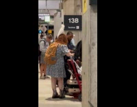 Collab WINY - Cockatoo bird on head of woman airport