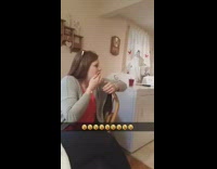 Girl throws pink jelly bean at mom