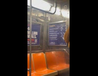 Condom filled with water hanged on subway