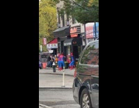 4 people wearing spiderman costume recreate meme on street