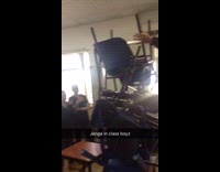 school kids stacking class chairs like jenga