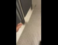 Dr Seuss costume guy in bathroom on skateboard