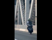 Guy rides electric unicycle at Brooklyn bridge