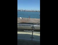 Headstand splits girl wood dock white boat