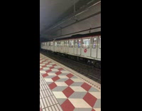 Guy wears horns on train 