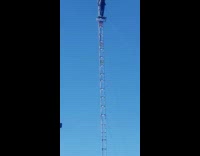 Man jumps from the height of 65 feet for a performance