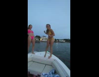 Three woman bikini jump yacht ocean