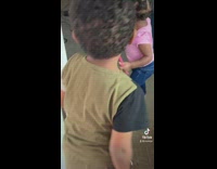 Guy yells at little girl and boy for fighting 