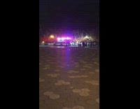 Blue toy car guy skateboard park night 