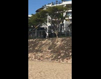 Woman white sleeves jog dance
black railings