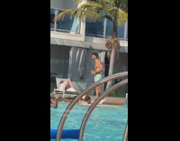 Man Teal Shorts shirtless photo shoot poolside Part 1