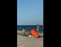 Blonde girl turquoise blue bikini beach