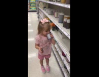 Young girl smell candle then swears reaction