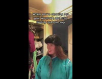 GIrl putting on different things in her closet
