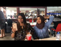 Two women hijab selfie photo shoot restaurant