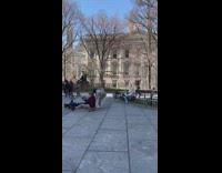 Man with puppet dragged by legs