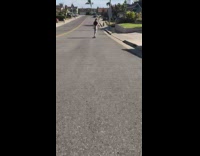 Girl Skateboards Downhill then Falls and Screams 